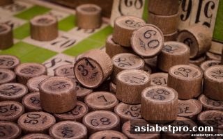 亚洲博彩网站视域下：彩票与金融市场的概率共性探析